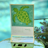 2025 Coastal Calendar with Gold Rim Acrylic Frame